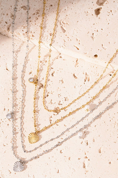 Dubbele hart ketting - goud/zilver